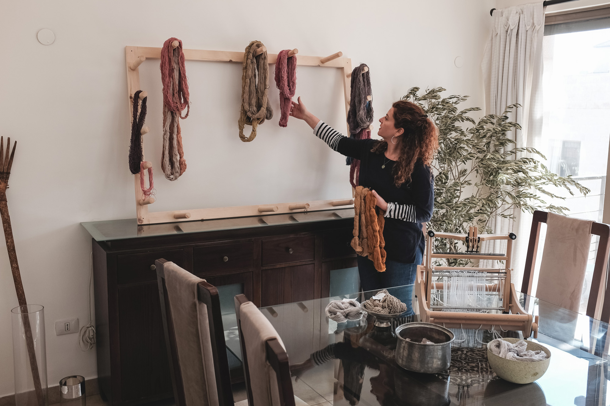 Showing samples of naturally dyed yarn