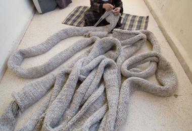 Local craftswoman works on the Entrelac - Raya Kassisieh & Nader Tehrani (NADAAA)